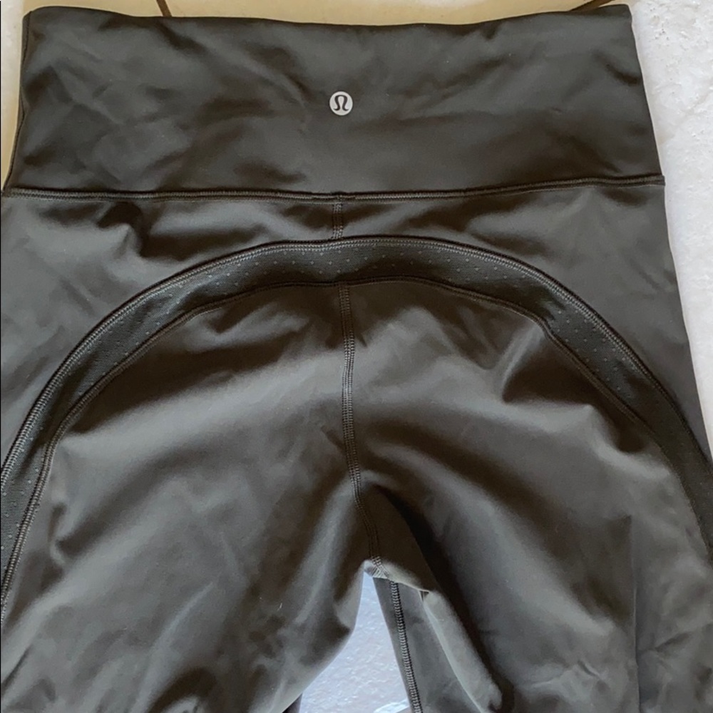 Dark olive green lululemon capris
